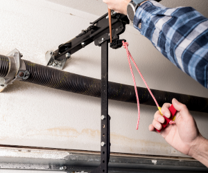 GARAGE DOOR BROKEN SPRING REPAIR SERVICES